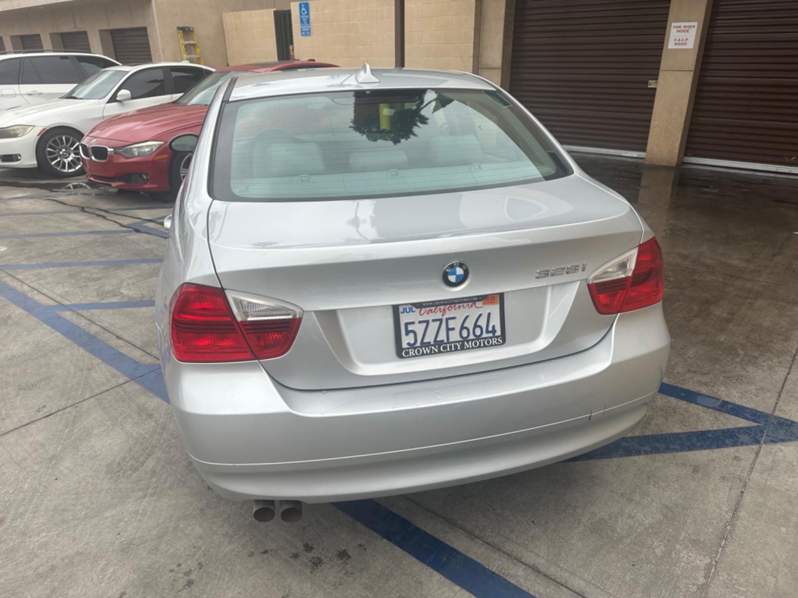 2007 Silver Metallic /Gray BMW 3-Series Leather (WBAVC53597F) with an 6 cylinder engine, Automatic transmission, located at 30 S. Berkeley Avenue, Pasadena, CA, 91107, (626) 248-7567, 34.145447, -118.109398 - Photo #3